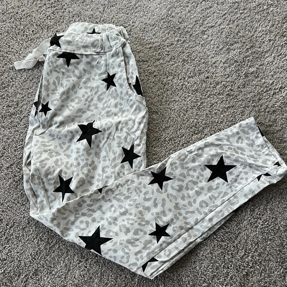 White cheetah/star pants